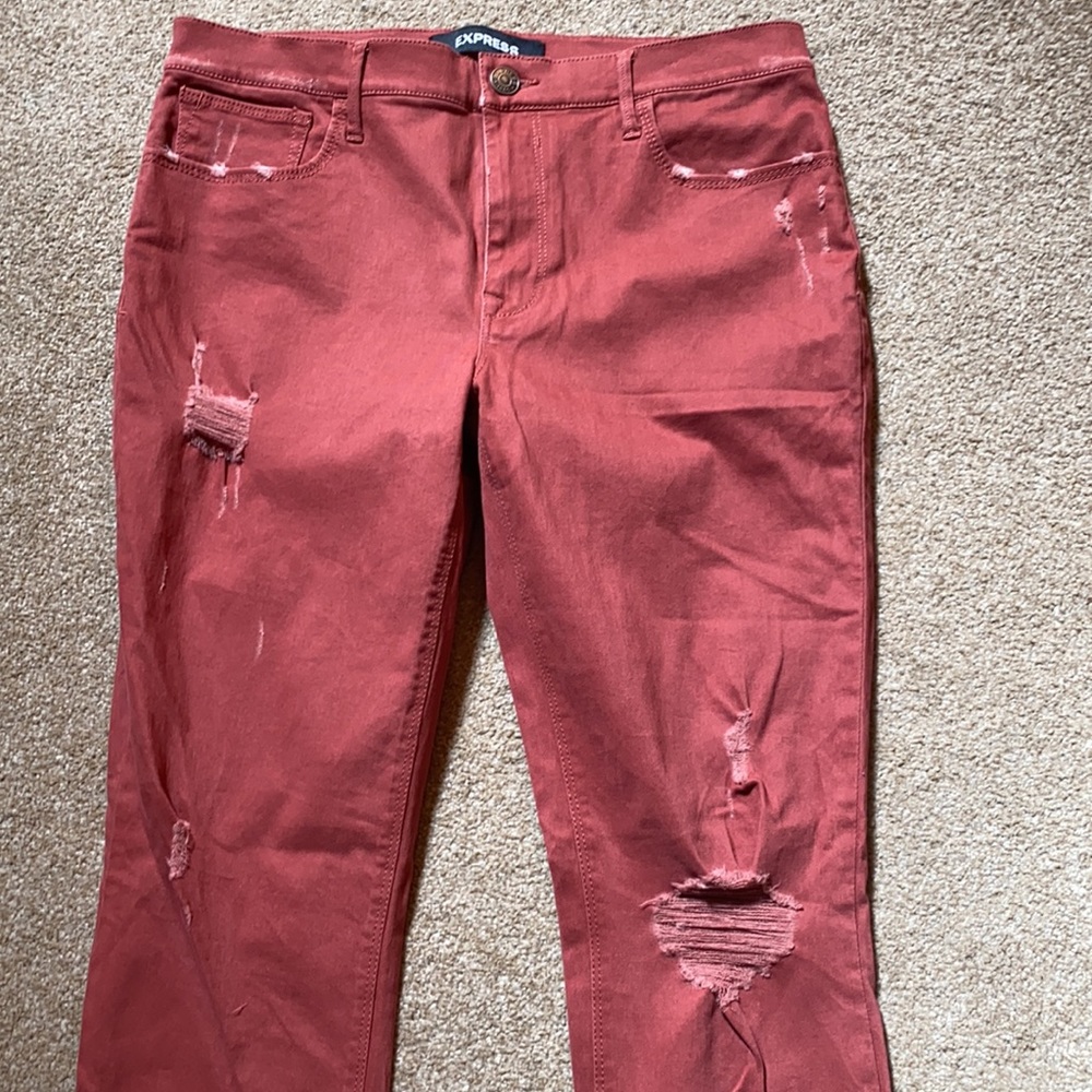 Express Cut hem, distressed reddish/pink skinny jeans
